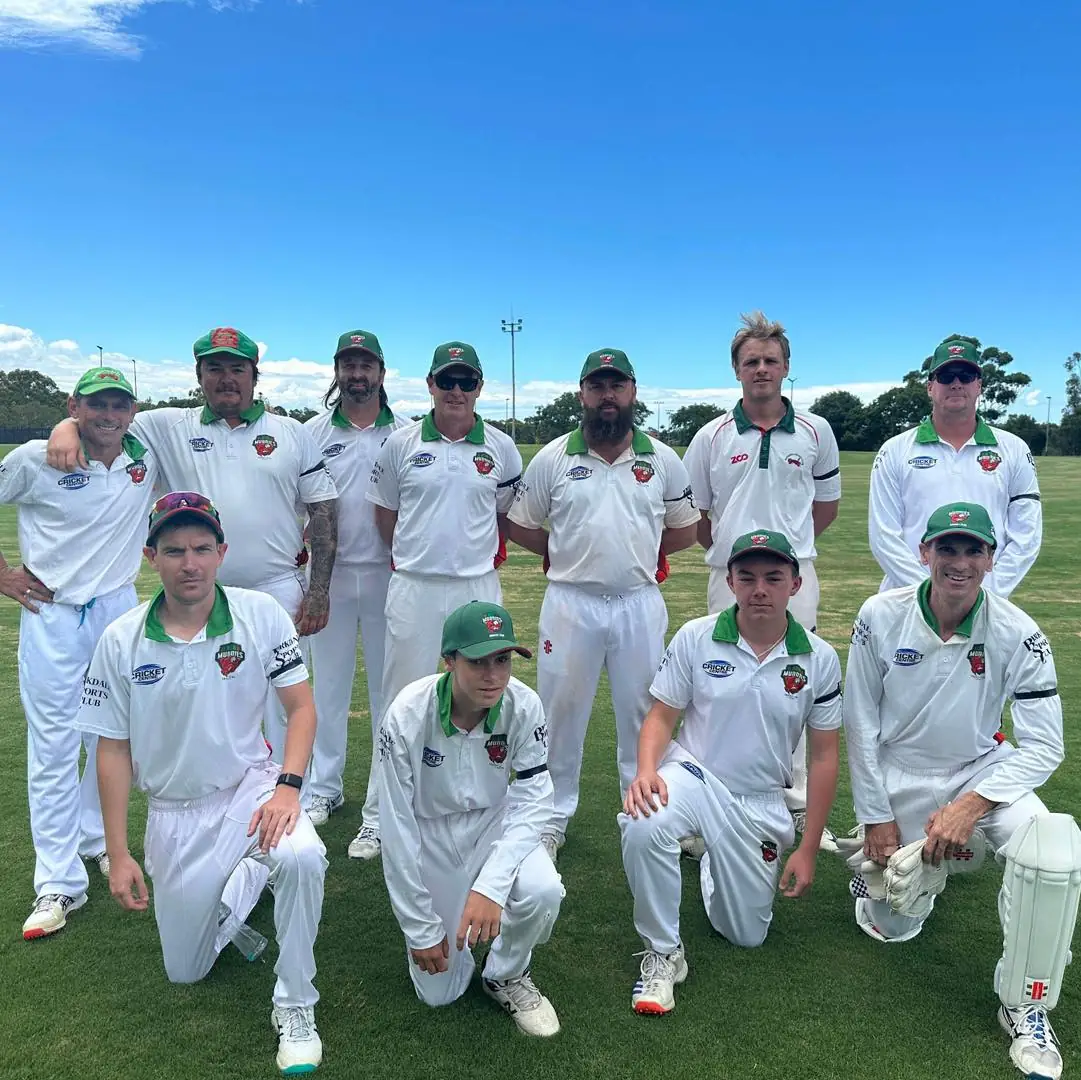 Muddies senior team posing together on the field
